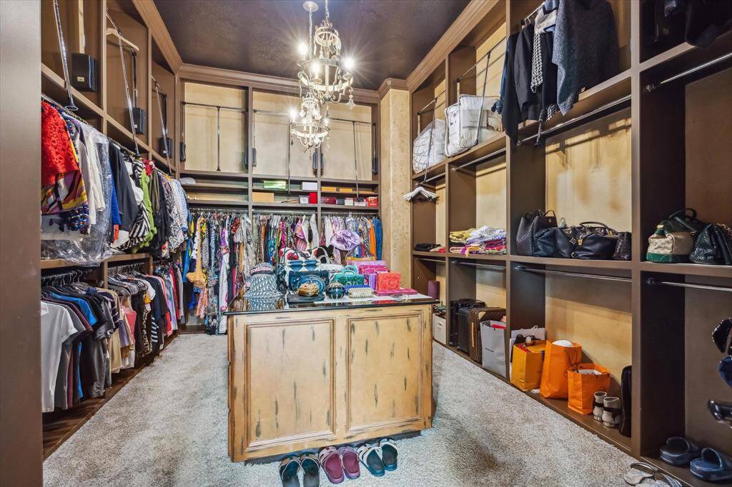 Large primary closet with island