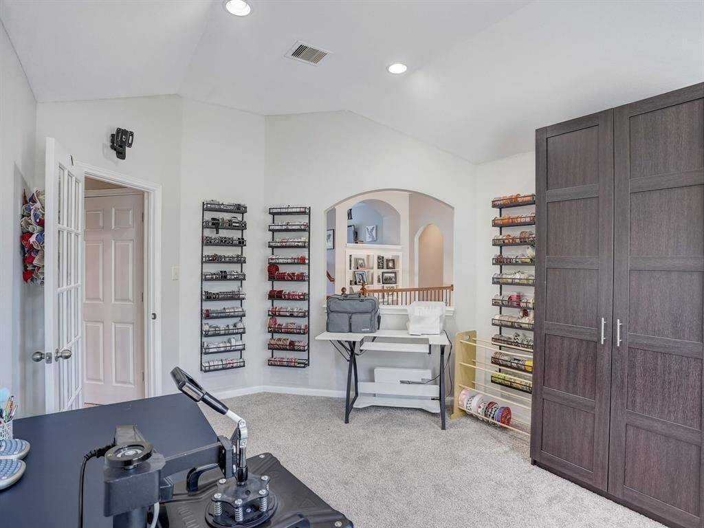 This loft is a really neat room because it can be used as an office or homework area.