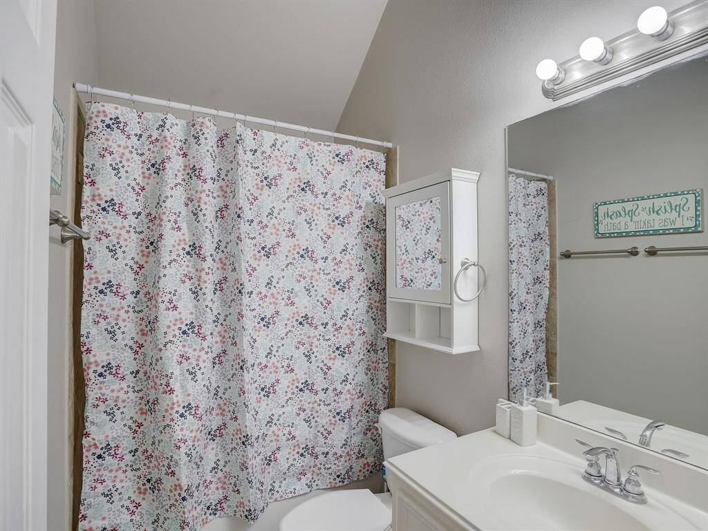 This bathroom is shared by Bedrooms 2 and 3.