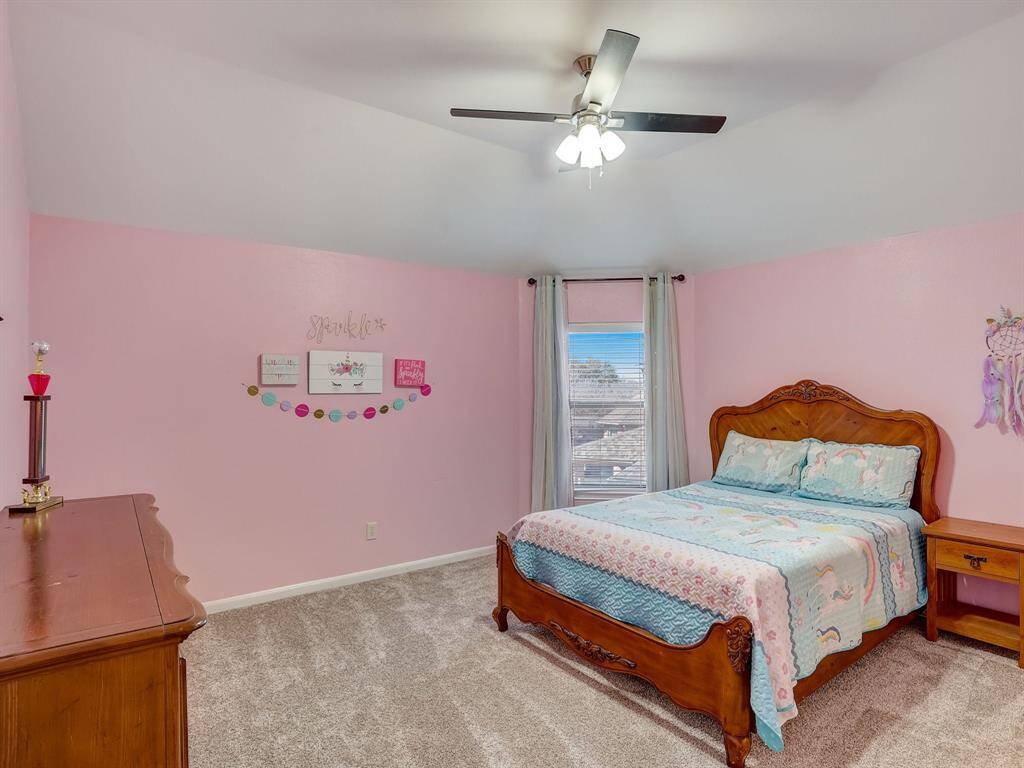 Bedroom 4 is painted in a pretty pink color!