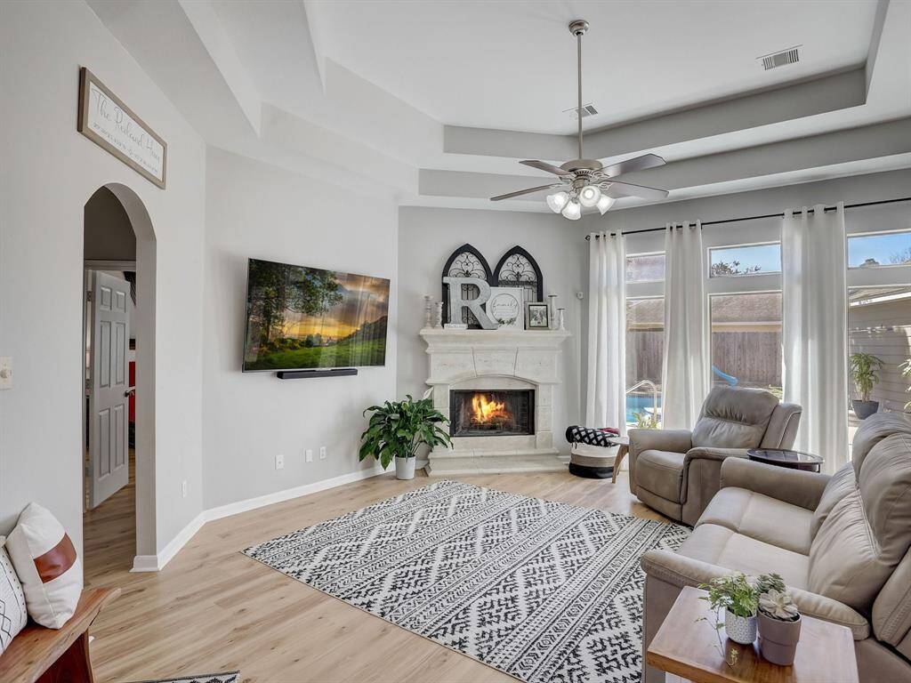 Wow! The gorgeous double tray ceiling adds elegance to the Family room!