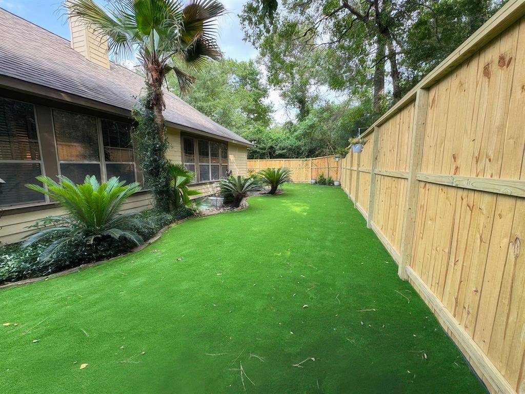 Private backyard with turf