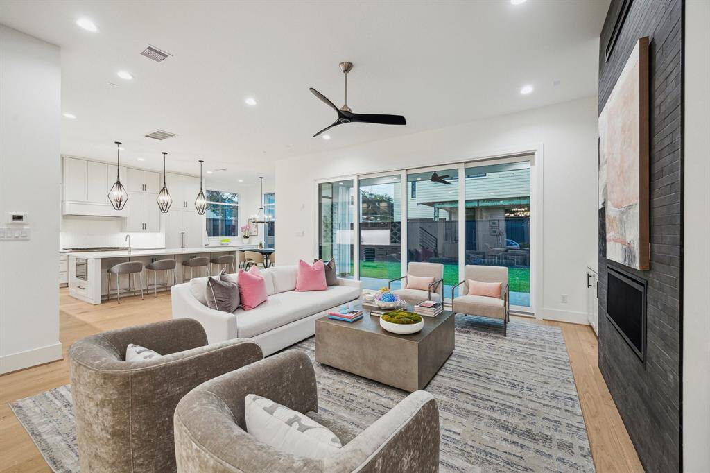 Generous size Family Room with a 42” Linear Direct Vent Fireplace with a 2 x18 Sahara Charcoal Tile Surround. There is a Conduit above the Fireplace for a TV and a Ceiling Fan. This Room is also Pre-Wired for Home Theatre (5 Speaker Locations and 1 Sub-Woofer).