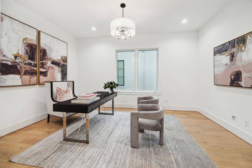 Second Floor Study with a 7 Light 24" Wide Drum Chandelier.  This Room is also Pre-Wired for Home Theatre (5 Speaker Locations and 1 Sub-Woofer).