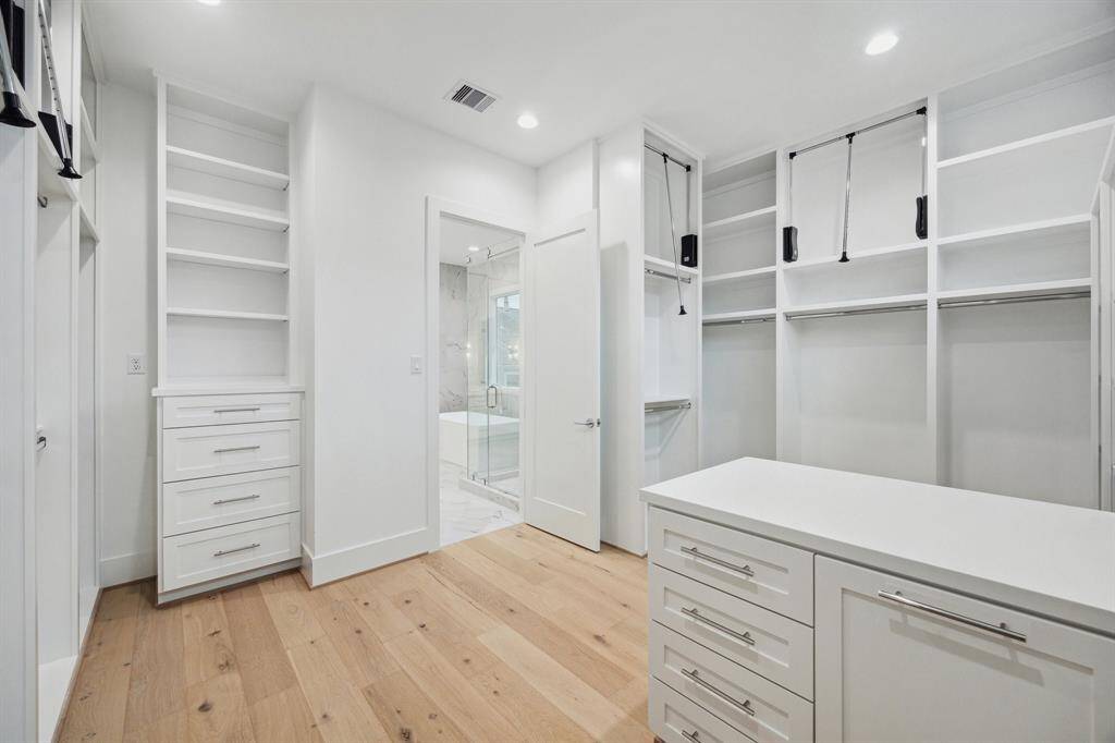 Another view of the Primary Bedroom, which also features pull-downs, built-In drawers and more...