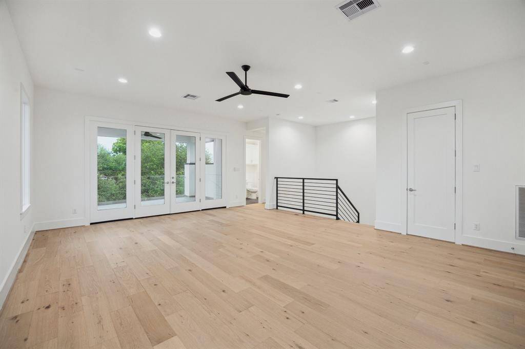 Another view of the Gameroom which also features a storage closet.