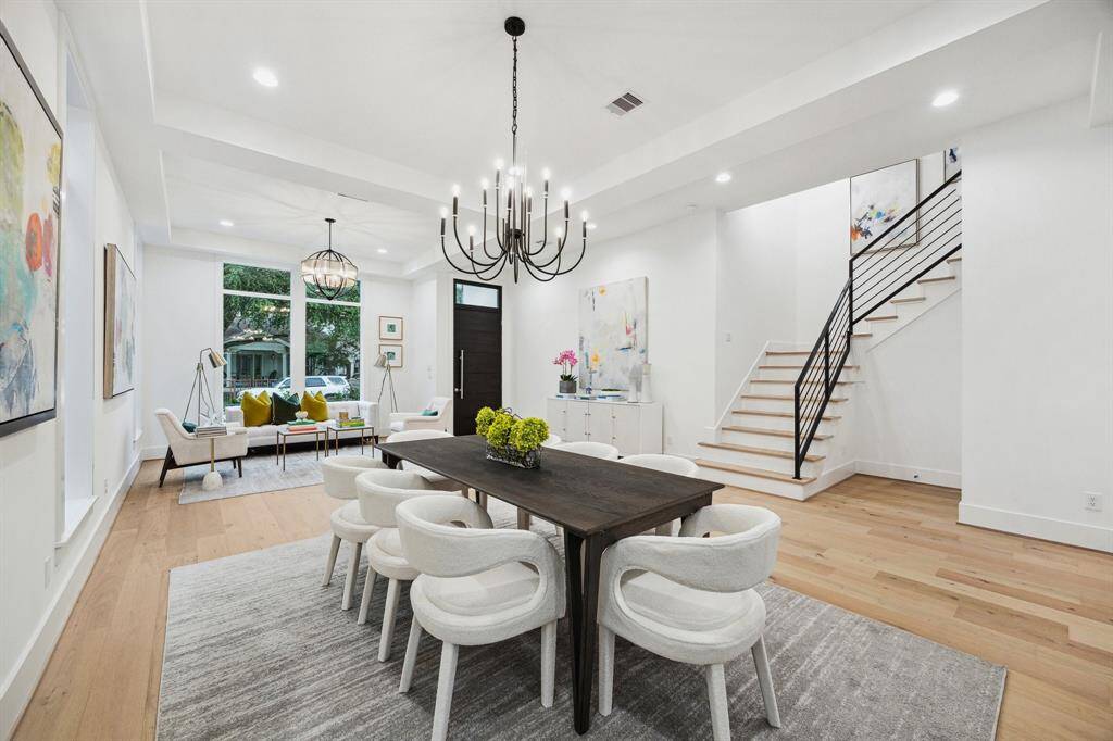 7 Inch European White Oak Plank floors throughout the home, except for second baths and utility. There are also 8 Inch Base Moulding throughout the home.
