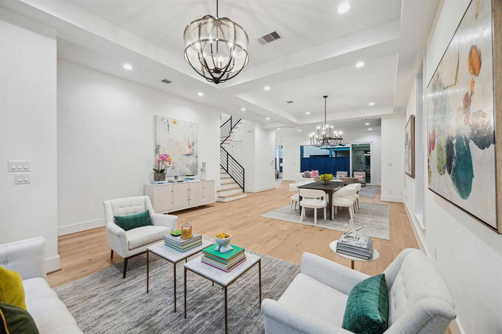 View from the Formal Living Room towards the Dining Room.  Look at that beautiful staircase!