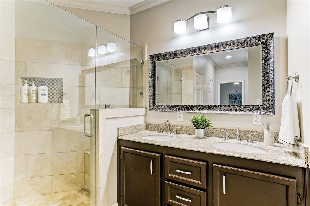 Master bath with double sinks and shower