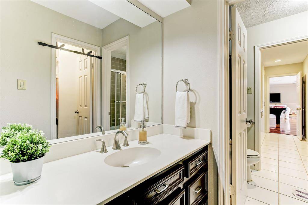 Private bath to second bedroom.