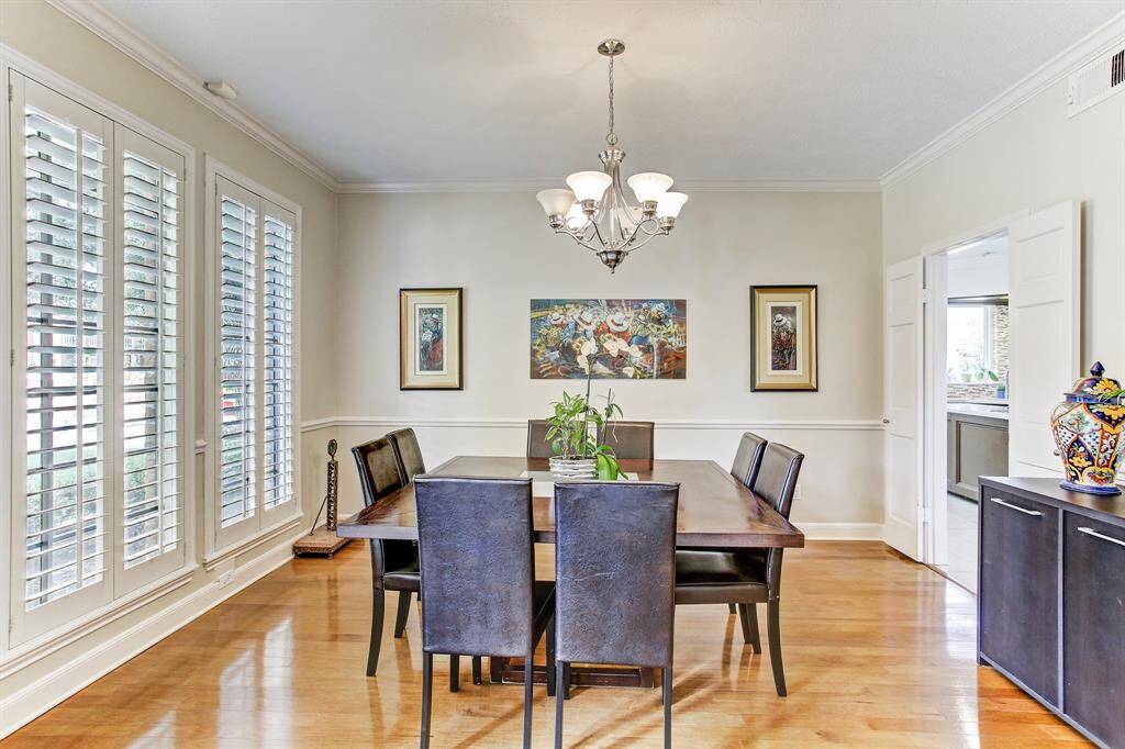 Great size formal dining room with nice plantation shutters
