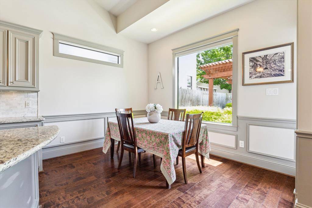 Separate breakfast room with large picture window is the perfect place for a morning cup of coffee
