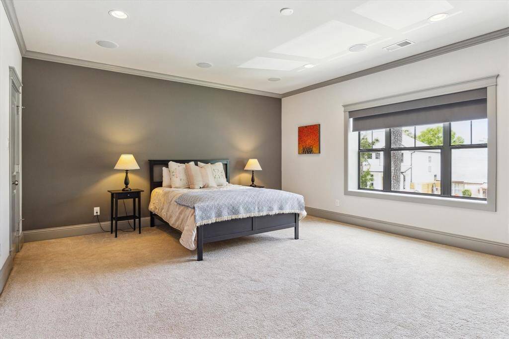 The largest of the three secondary bedrooms, this room can also have a seating area. Great size walk in closet