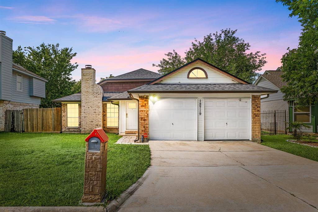 Charming single-story home with much space for parking.