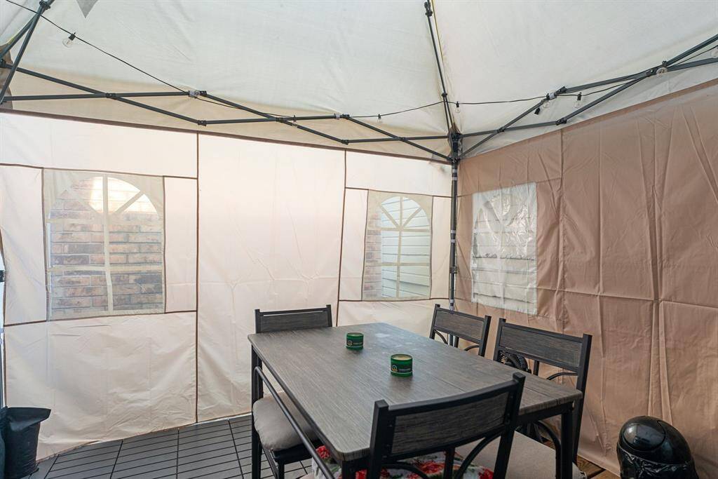Perfect for shaded patio dining, outdoor gatherings, or backyard lounging, this semi-enclosed space offers added privacy and protection from the elements.