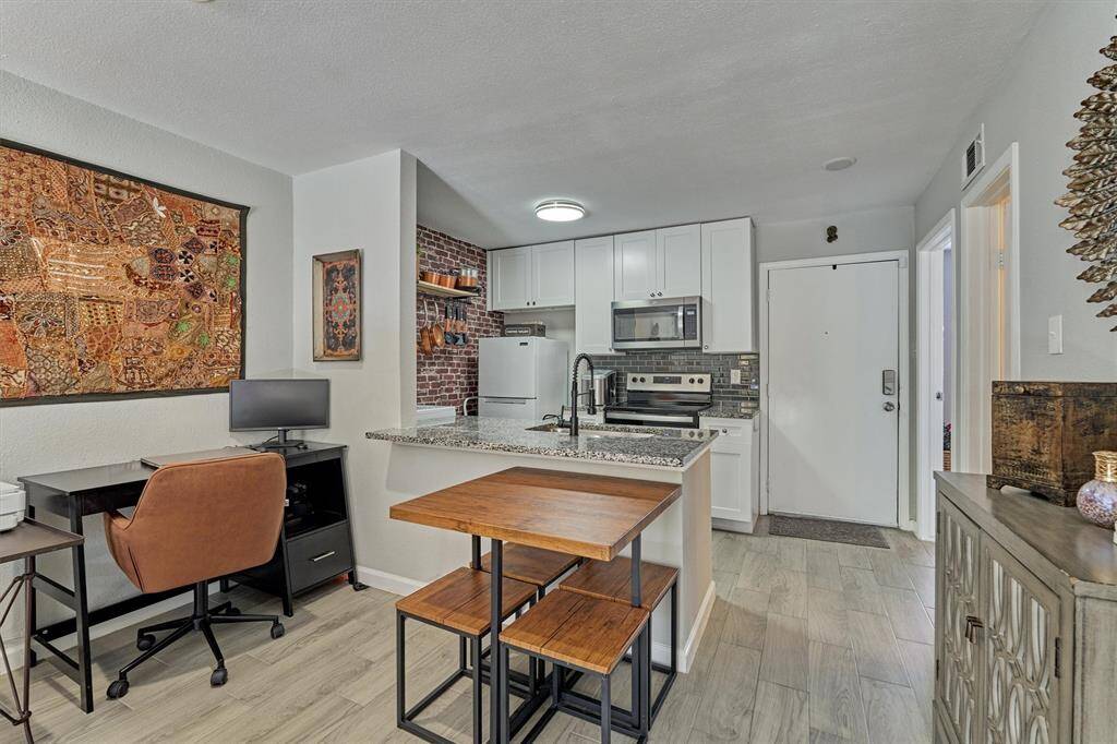 The dining area and breakfast bar provide a great space for entertaining.