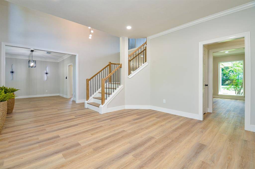 Soft tones with neutral flooring gives a warmth throughout the home