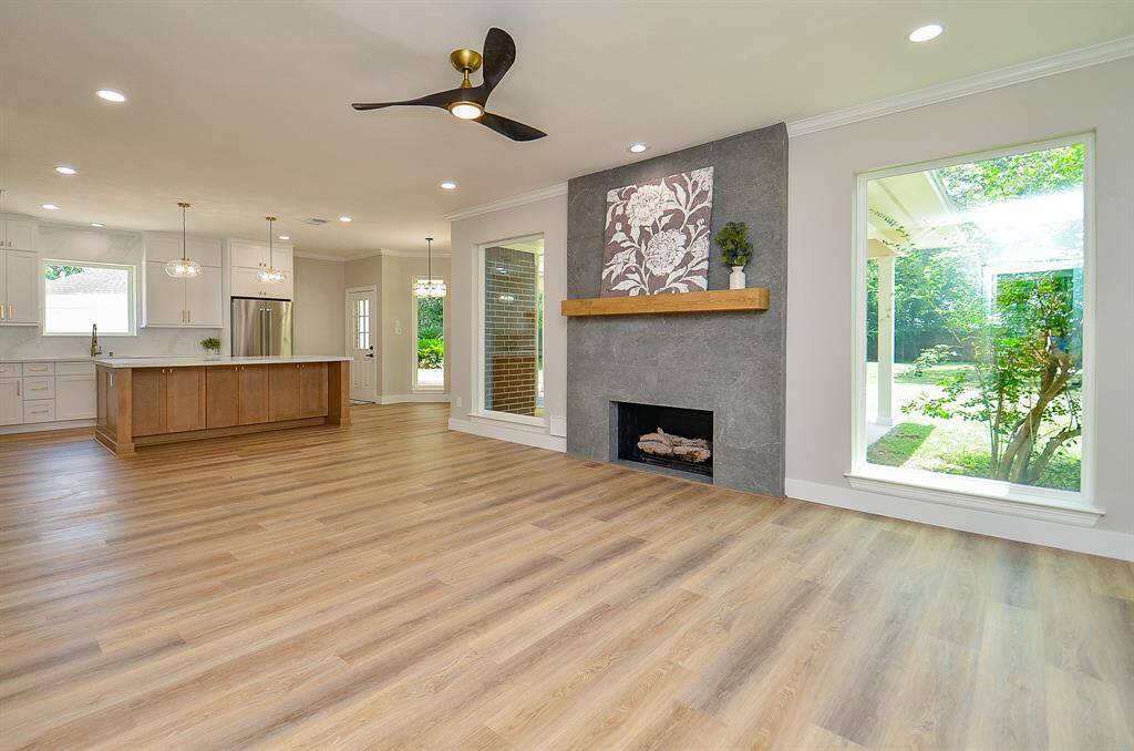 Gas log fireplace is the focal point of this beautifully designed home creating a relaxing evening by the fire.