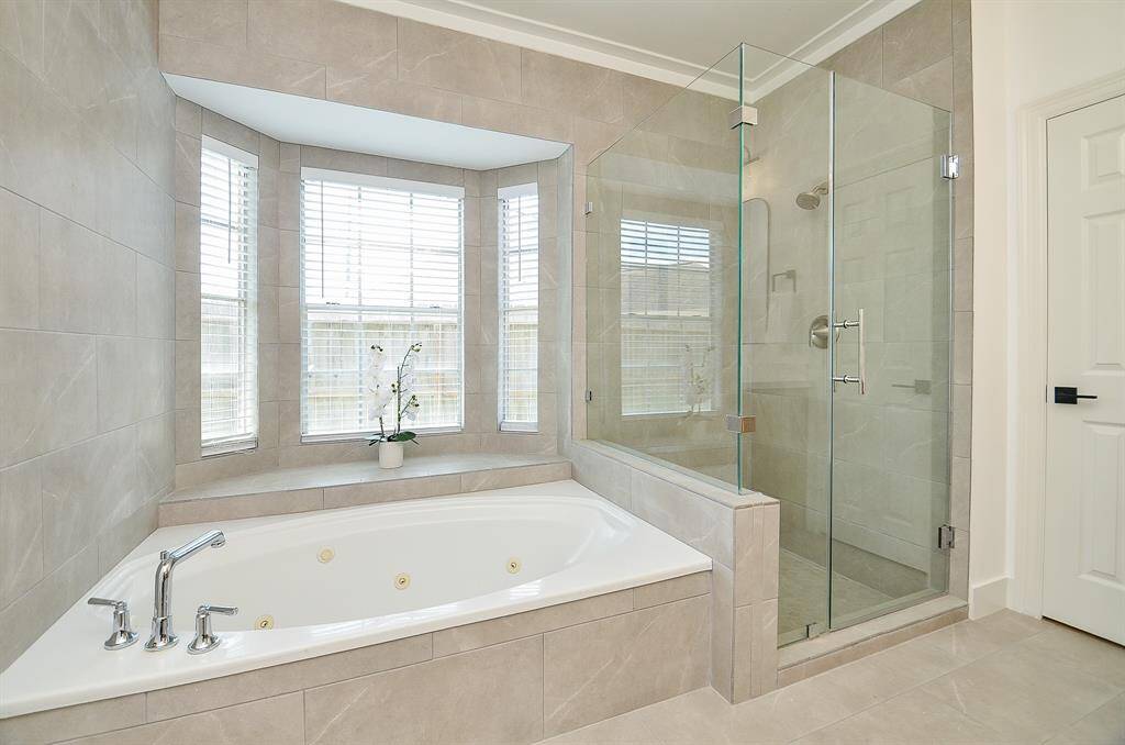 Enjoy a massage in the Jacuzzi tub or soak those long days away