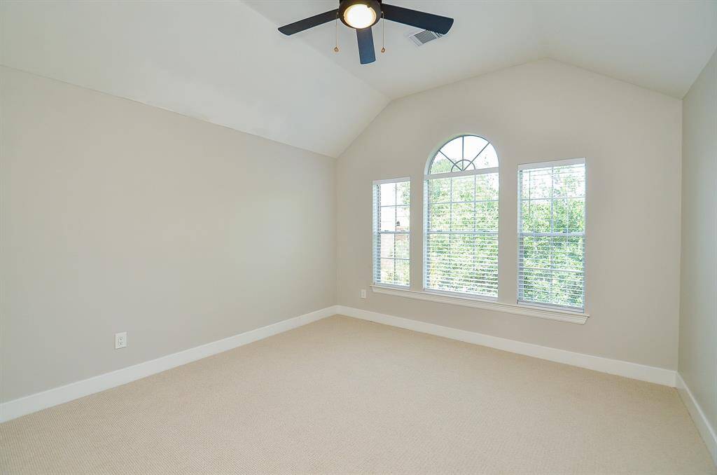 Bedroom #1 Upstairs includes 2" blinds with a remote controlled light and fan with 5" baseboards and plush high-end carpet