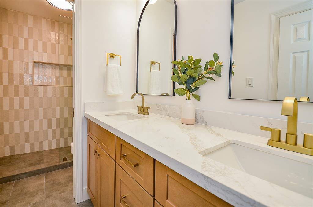 Wow! Stunning design with a sleek pocket door design giving more space for this lovely bathroom