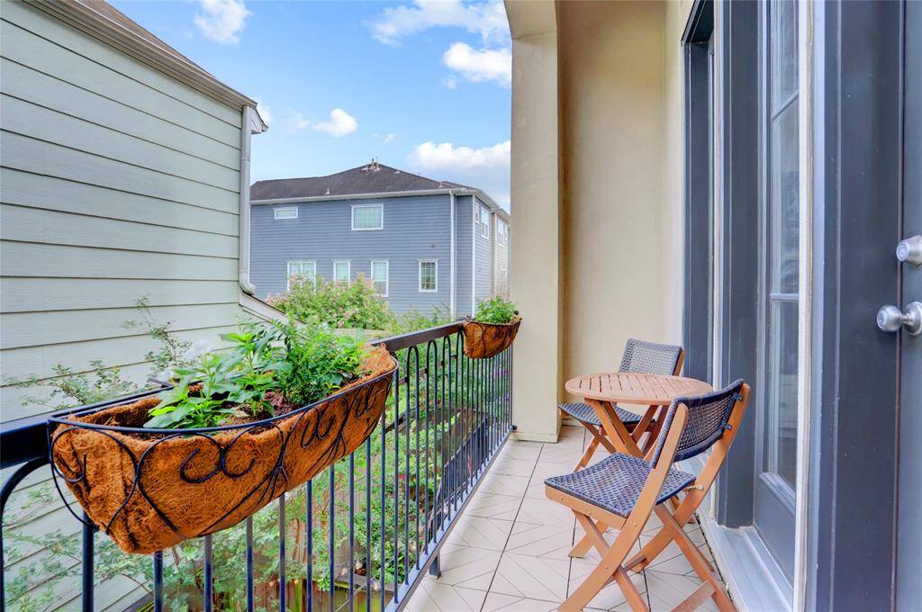 This is one of 3 balconies. This one is located off the kitchen. These planter baskets would make a great place to grow fresh herbs to use in your favorite recipes! Perfect spot for morning coffee or in the evening with a cool beverage.