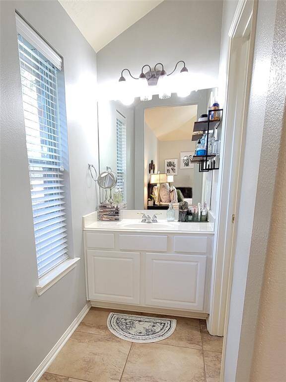 All bedrooms are primary-sized, and Bedroom 2 is no exception. It features high ceilings, a seating area, upgraded pivoting windows and interesting architectural detail.