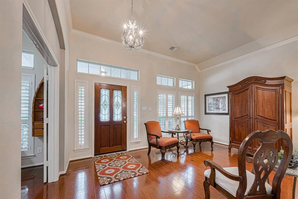 3 large bedrooms and 3 bathrooms downstairs. Flex room upstairs: game room, bedroom, studio, gym, etc.