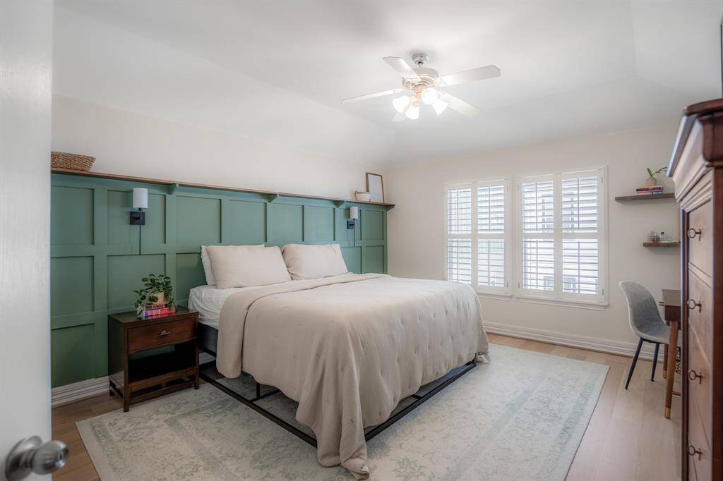 The serene primary suite combines generous proportions with calming hues and custom trim work, creating the kind of stylish bedroom you’ll actually want to wake up in. You also get maximum privacy being at the opposite end of the second floor from the other bedrooms.