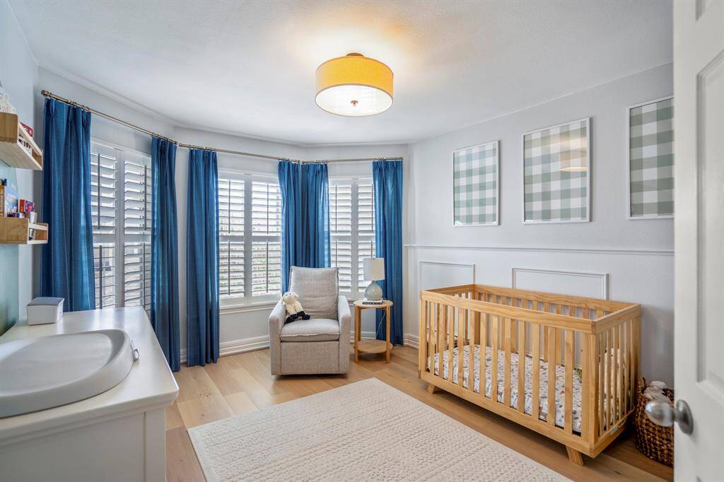 Just down the hall Soft natural light, generous space, and charming design touches make this nursery a peaceful retreat for little ones (and their grown-ups too).