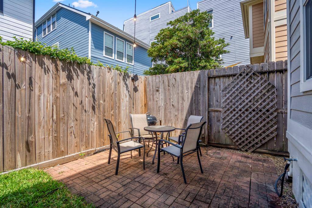Another look at the patio shows just how easy it is to make this outdoor space your own, whether you’re hosting or just hanging out.