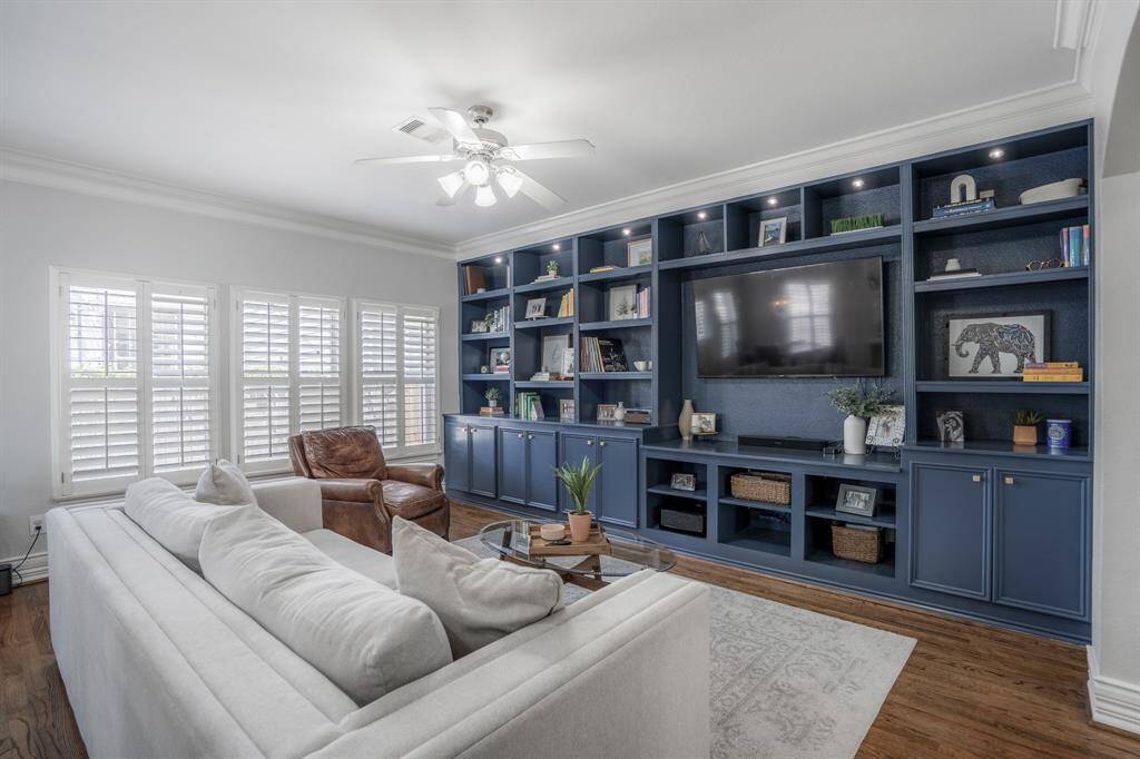 Recently painted, framed by beautiful millwork and elevated by thoughtful design, this central living space brings together comfort, color, and functionality in a way that feels both current and timeless.