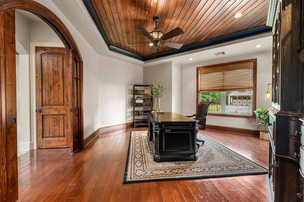 Another handsome view of the amazing study with hardwood flooring and private en-suite.