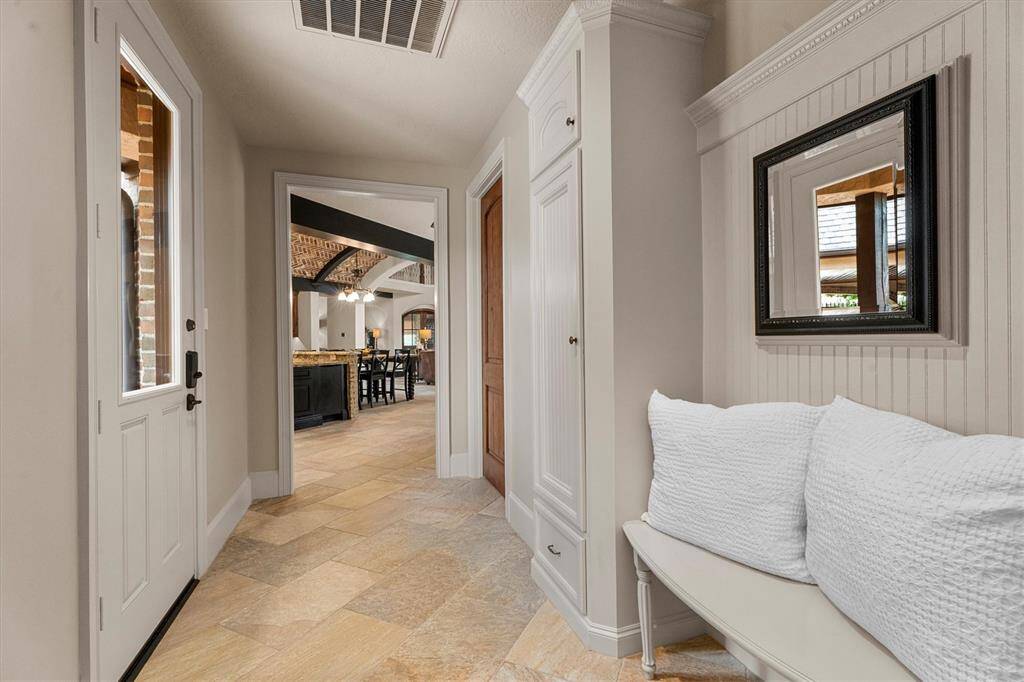 Owner entrance off of the garage with mud room.