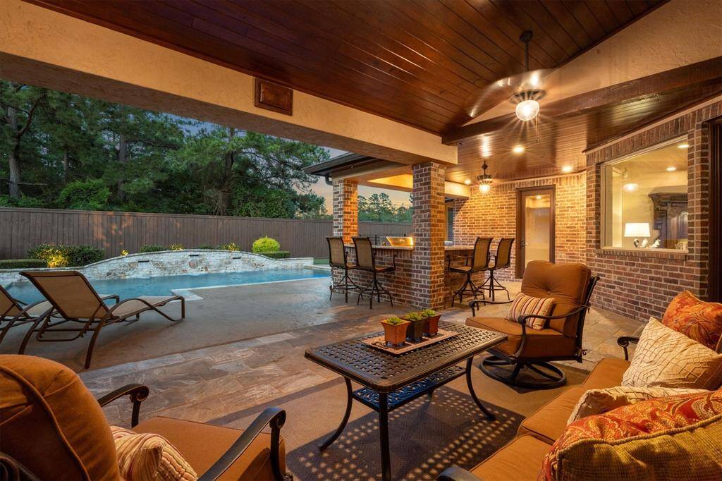 The Covered patio even offers a pull down movie screen with projector.  Sit in your pool and watch your favorite sports team!