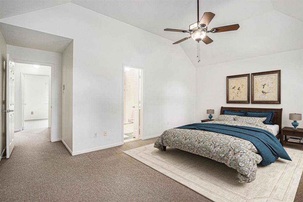 Upstairs primary bedroom - virtually staged