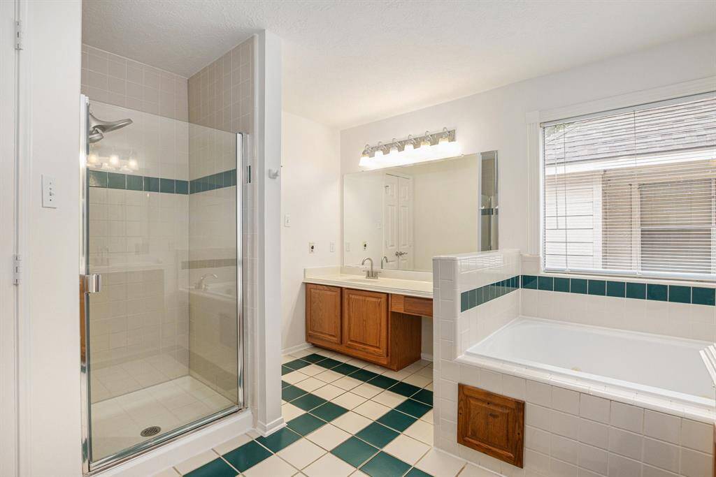 Upstairs - full primary bath - TWO closets