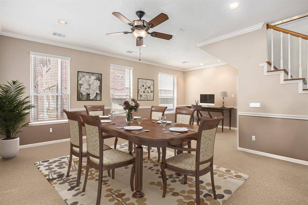 This angle also shows formal living and dining area - virtually staged. Plenty of room for multiple uses!
