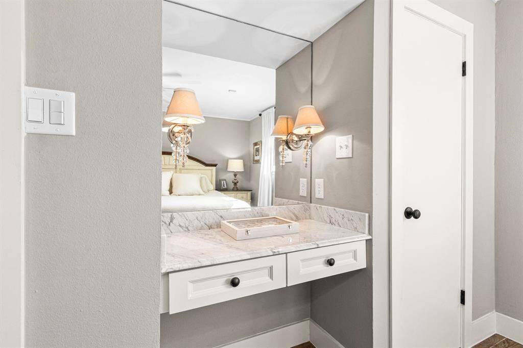 PRIMARY BEDROOM- Built-in vanity or desk area in the primary bedroom.