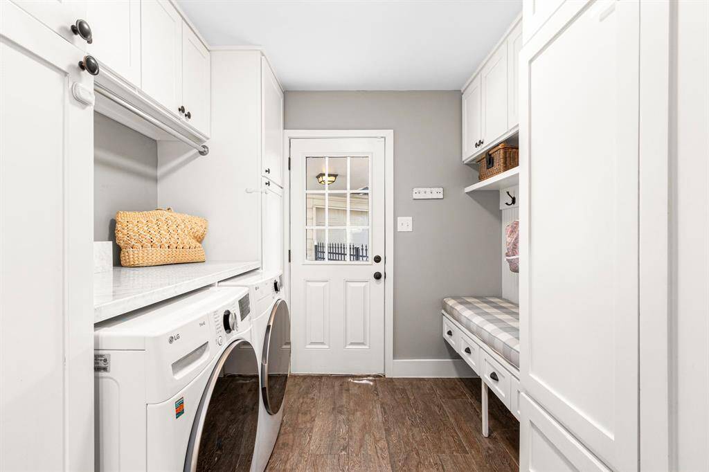 UTILITY ROOM - Perfect spot for shoes and backpacks! Enjoy the counter for laundry folding above the washer and dryer.