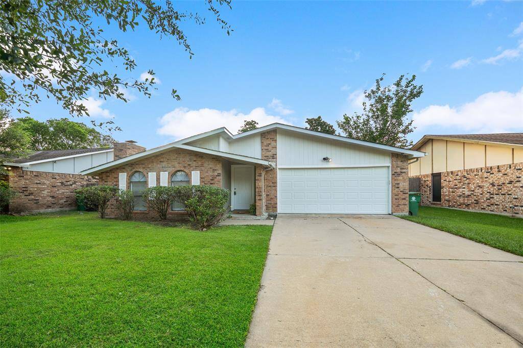 2 car garage. Nice sized concrete driveway. Beautiful green grass