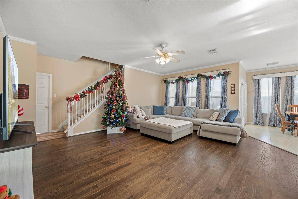 This cozy living room is situated perfectly in the house. It gets nice natural light as well.