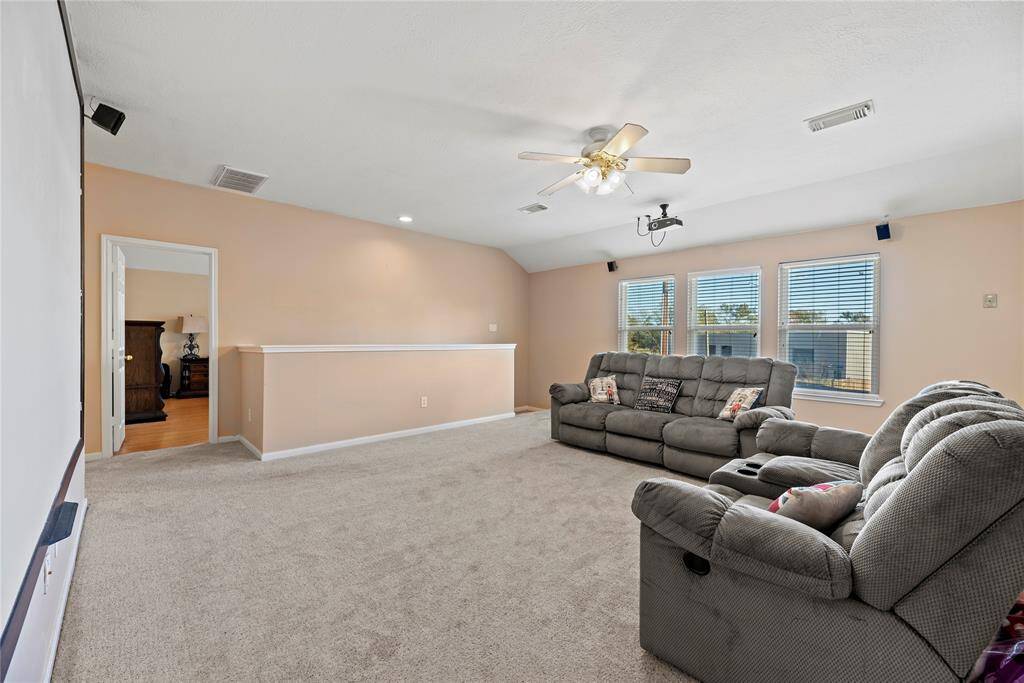 Again notice the brand new windows and oversized game room.