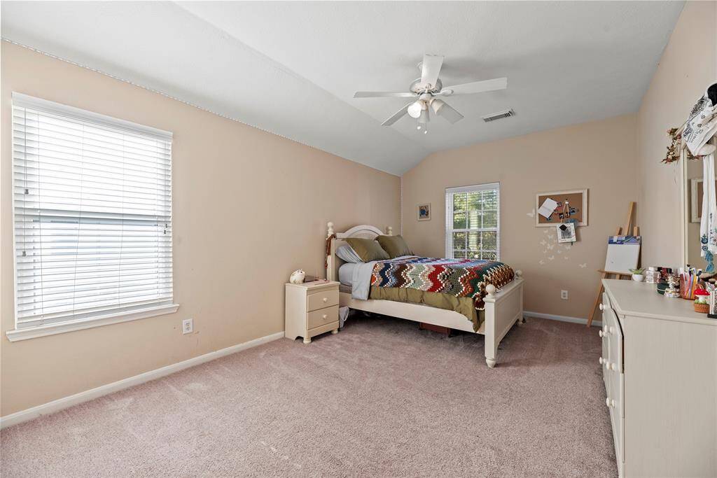 Another very large bedroom with new windows and carpet.