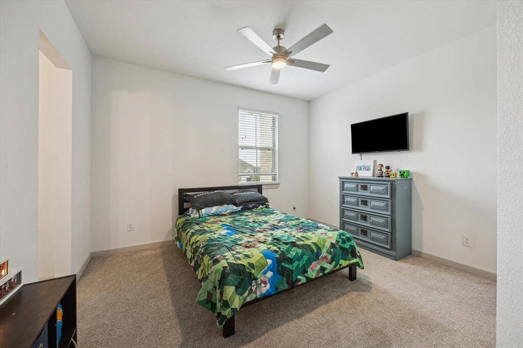 Alternate view of game room with easy access to the staircase.