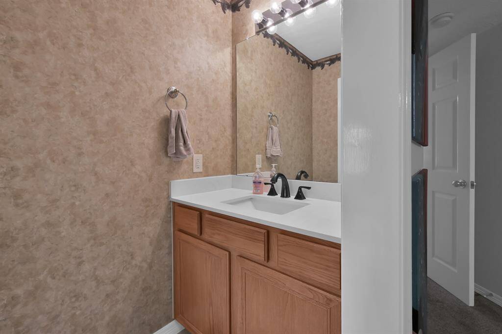 A separate sink located off this bedroom leading to the Jack-n-Jill bath.