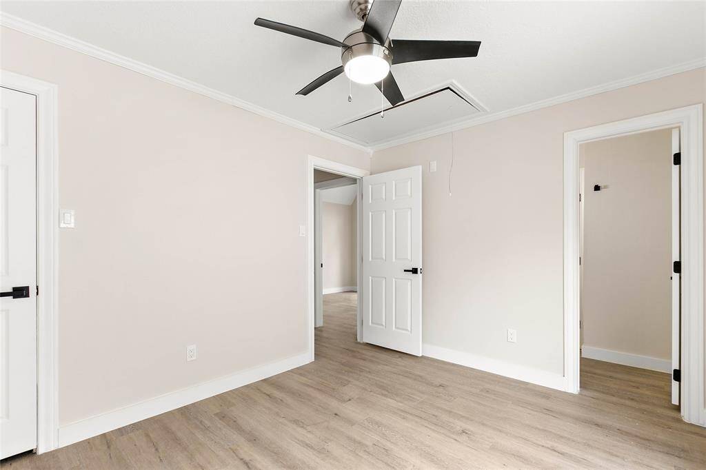 Three spacious bedrooms are found on the upper level.