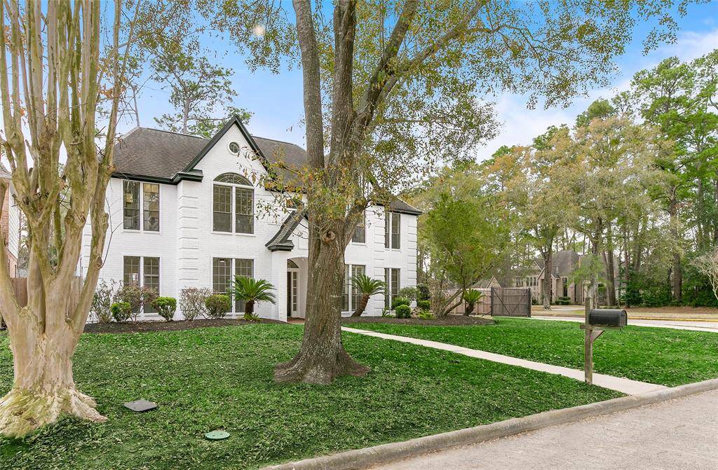 This quiet neighborhood is surrounded by mature trees, providing great curb appeal & charm.