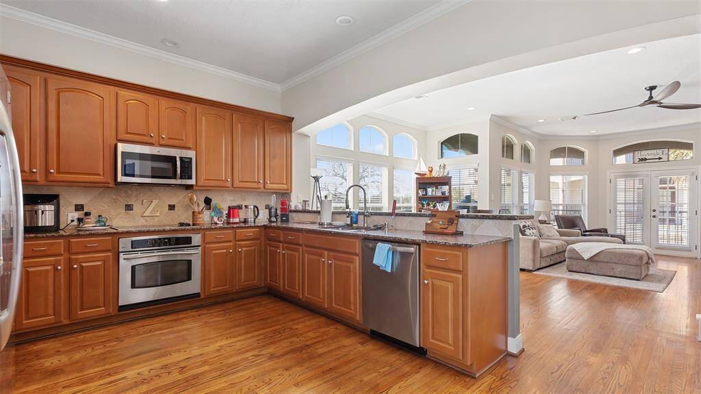 Open kitchen overlooking living and dining area