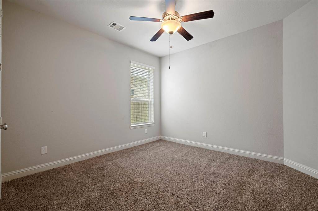 This flexible DOWNSTAIRS BEDROOM it's ideal for guests, a nursery or a mother in law suite.